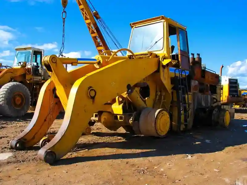 Dismantled Machines - yellow excavator