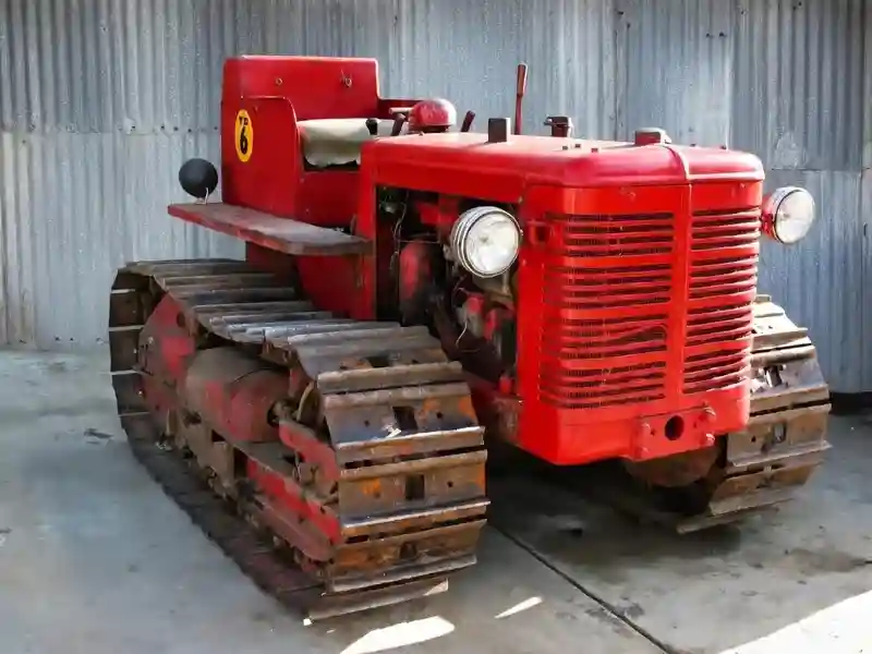 Vintage Tractor Parts - red International Harvester crawler